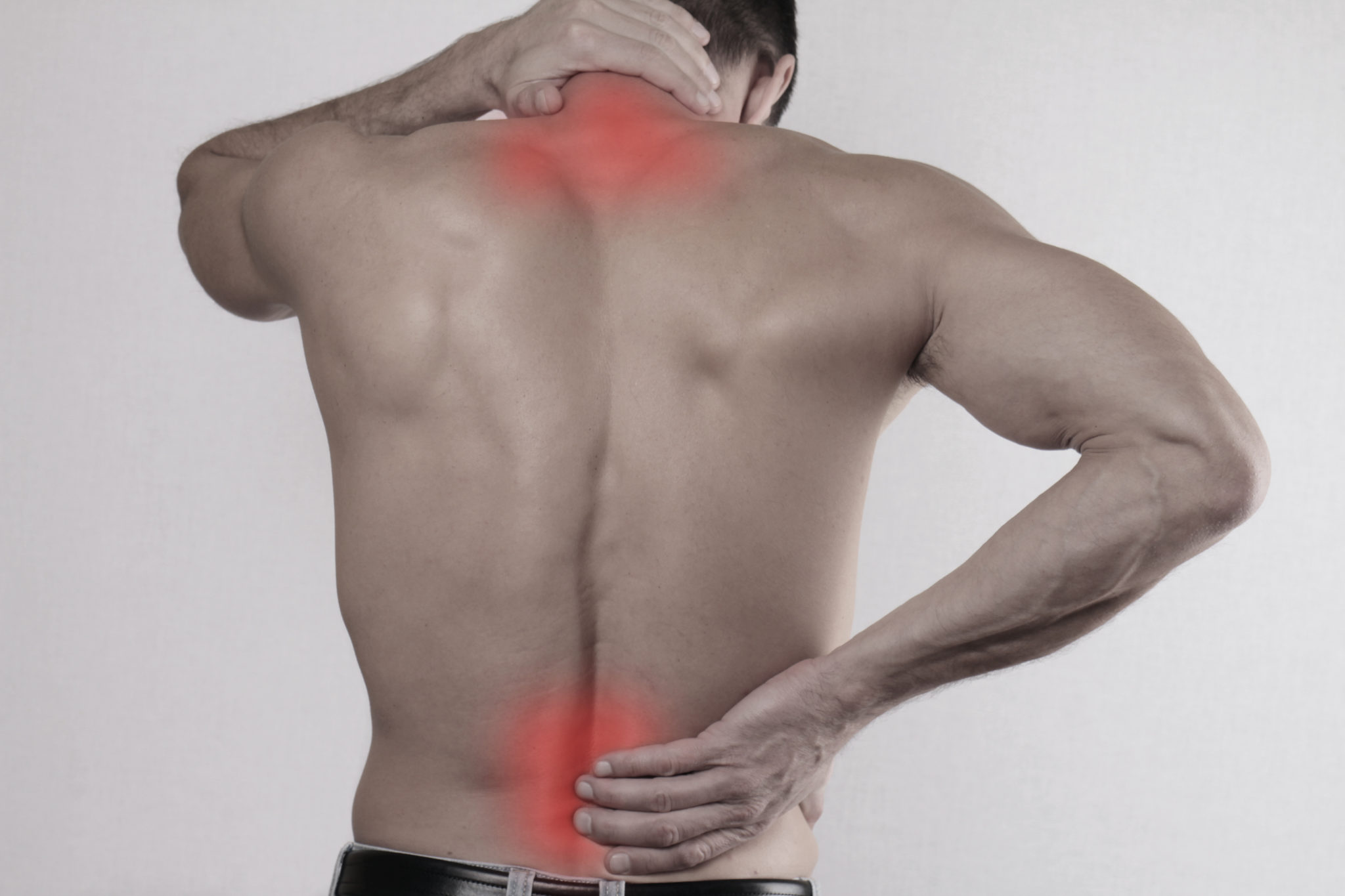 Man with neck and lower back pain