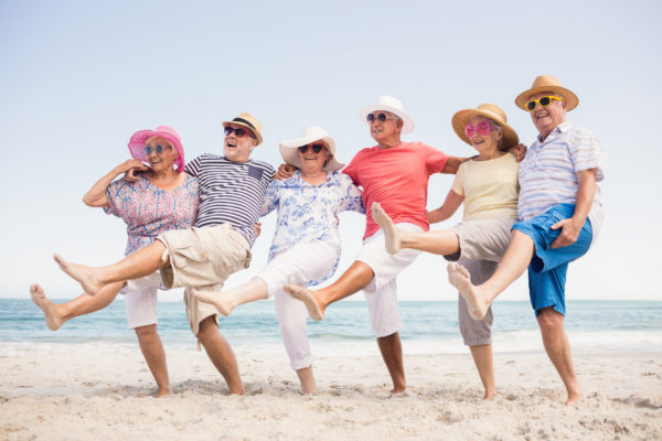 Elderly People Dacing on a Beach