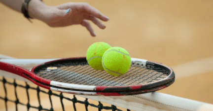 tennis racket and tennis balls