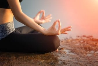 Women's Hands in a Meditation Pose