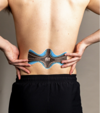A FIT® Therapy Back Patch applied to the lower back